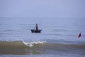 Da Nang, Vietnam, January 16, 2020, Vietnamese fisherman flying inside a round bamboo Royalty Free Stock Photo